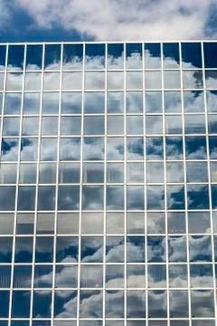Clouds reflected in windows Stock Photos
