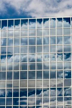 Clouds reflected in windows Stock Photos