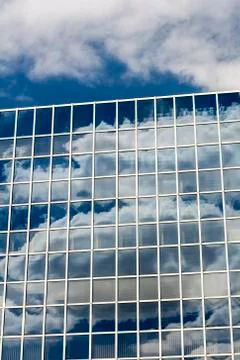 Clouds reflected in windows Stock Photos