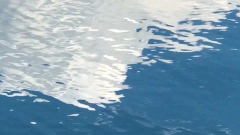 Clouds Reflecting In A Blue Lake Stock Footage 137185891