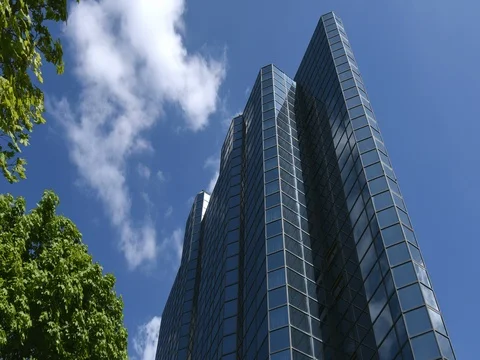 Clouds Reflecting in Glass Building Timelapse Stock Footage 76312374
