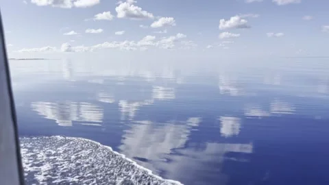 CLOUDS REFLECTING IN THE WATER Stock Footage 305277000