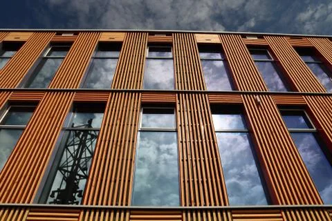 Clouds reflecting in the windows of the Town Hall of Zuidplas Stock Photos