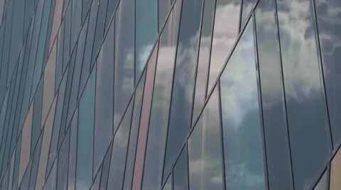 Clouds reflection in glass walls Stock Footage 52789744