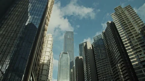 Clouds reflection in Guangzhou downtown office buildings and skyscrapers Vídeos de archivo 136136925