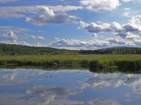 The clouds reflection Stock Photos