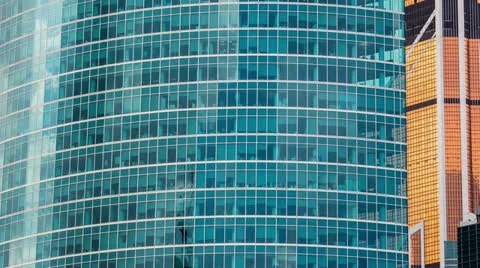 The clouds reflection on the sky-scrapers windows, RAW VIDEO: 6K,4K &amp; 1080p res. Video stock 25912619