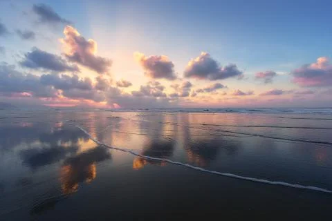 Clouds reflections on beach Stock Photos
