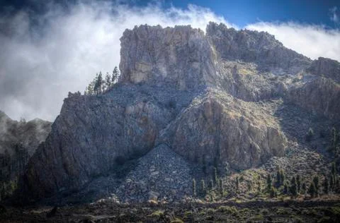 Clouds rest on the mountains Stock Photos
