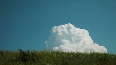 Clouds rise above the horizon. Stock Footage 96046491