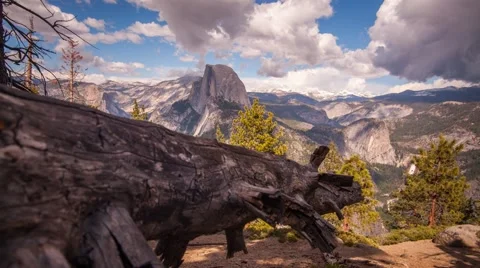Clouds rise from behind epic Half Dome in beautiful Yosemite Video stock 60689159