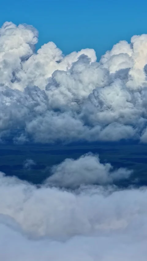 Clouds Rise High In Open Sky As Soft Layers Drift By Stock Footage 337495539
