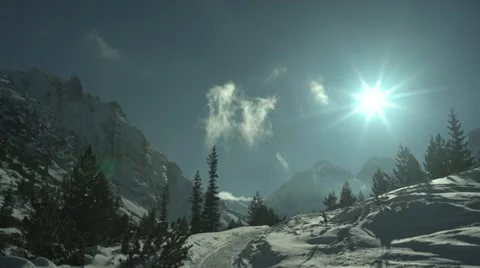 Clouds Rising Sun Flares High Peaks Video stock 59776319