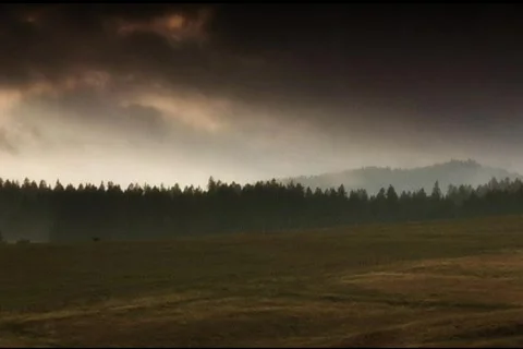 Clouds roll over hills and forest Stock Footage 110851