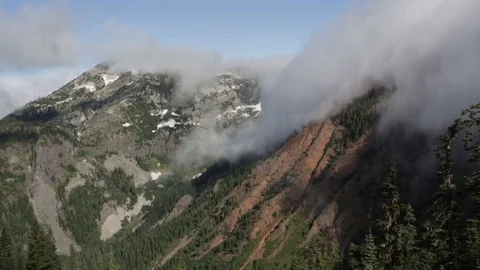 Clouds Roll In Over Mountains Near Snoqualmie Pass Stock Footage 91466643