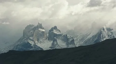 Clouds roll over Torres del Paine in Patagonia Stock Footage 12468119