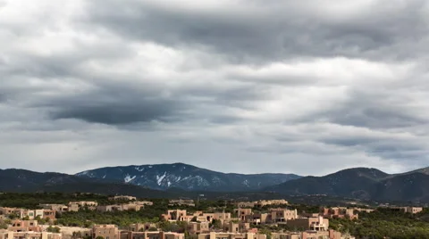 Clouds roll past a Santa Fe suburb Video stock 60732217