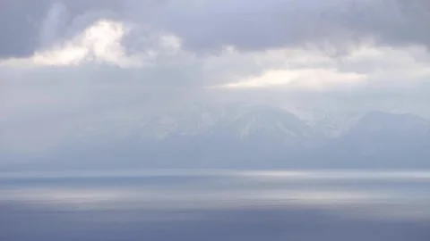 Clouds rolling across Lake Tahoe 動画素材 130760081