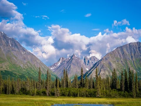 Clouds rolling across mountain peaks in Alaska Stock Footage 70519249