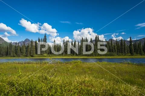 Clouds rolling across mountain peaks in the Talkeetna Range in South-central Ala Stock Photos