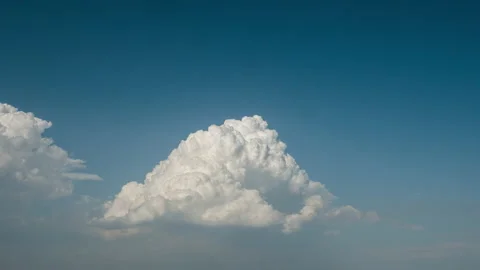 Clouds Rolling and Building Timelapse With Blue Sky Video stock 153354982
