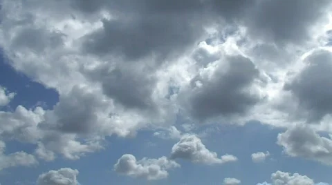 Clouds rolling in blue sky time lapse Stock Footage 610259