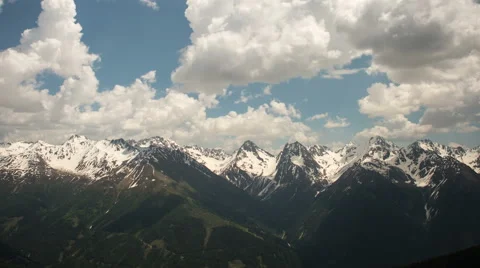 Clouds rolling over alpine landscape Stock Footage 44471236