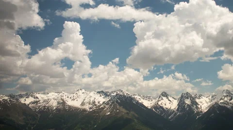 Clouds rolling over alpine landscape Stock Footage 44475859