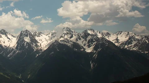 Clouds rolling over alpine landscape Stock Footage 44477089