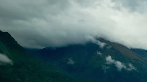 Clouds rolling over mountain range Stock-Footage 35859250