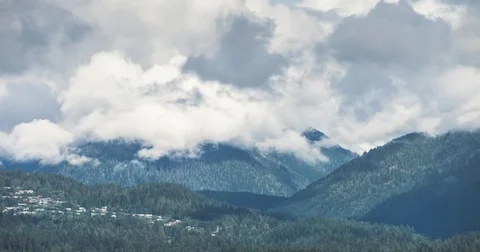 Clouds rolling over North Vancouver mountains Stock Footage 82439371