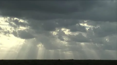 Clouds rolling over open field 스톡 동영상 12761431