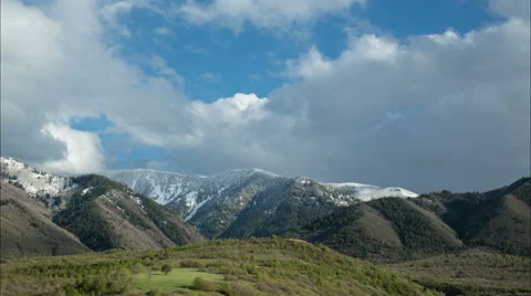 Clouds rolling over the Rocky Mountains Stock Footage 38039190