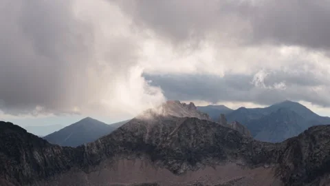 Clouds Rolling Over Rugged Dolomites Peaks in Dramatic Mountain Landscape Видео 346822807