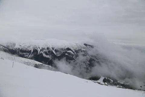 Clouds Rolling Over Ski Slope in Jasna Low Tatras Fotos Stock
