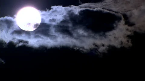 Clouds rolling over sun in dark dramatic blue sky HD Video 스톡 동영상 24612444