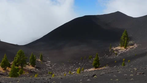 Clouds rolling in over Volcanic Craters in the Canary Islands Stock Footage 335804780