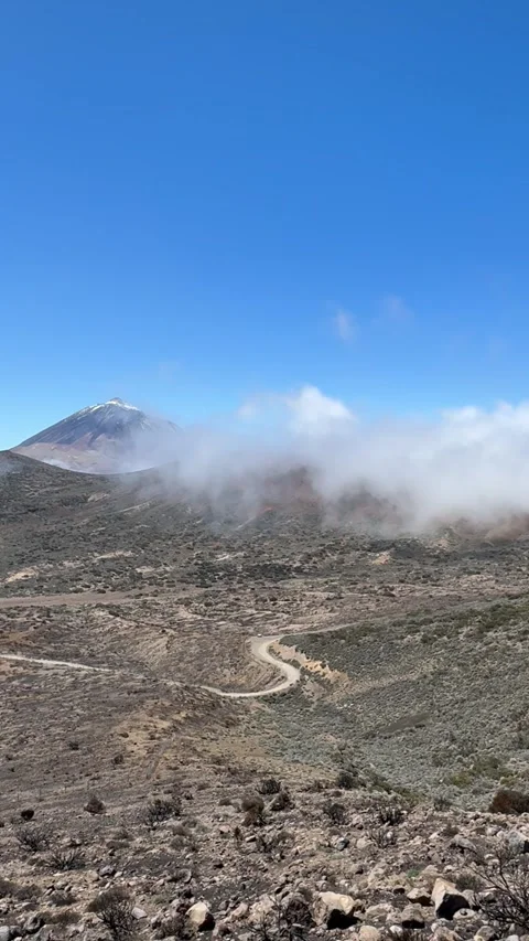 Clouds rolling over the Volcano Teide in Tenerife Canary Islands Stock Footage 311514041