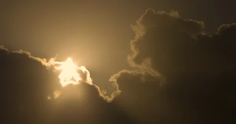 Clouds Rolling in Sky with Gold Sun, 4K60p Stock-Footage 101071652