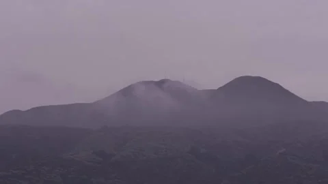 Clouds Rolling Through The Mountains Stock Footage 168835632