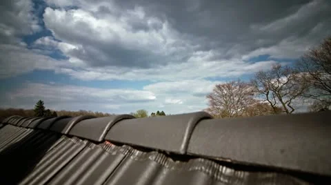 Clouds on a Roof Timelapse 4K Stock Footage 12365648