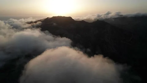 Clouds round mountainpeak Serifos Greece Stock Footage 221760618