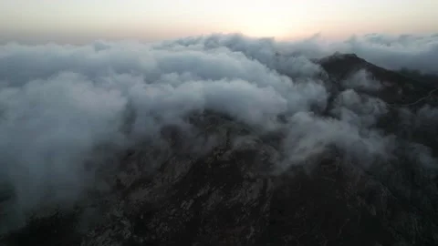 Clouds round mountainpeaks Serifos Greece Stock Footage 221760795
