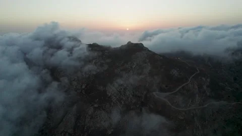 Clouds round mountainpeaks Serifos Greece Stock Footage 221760925
