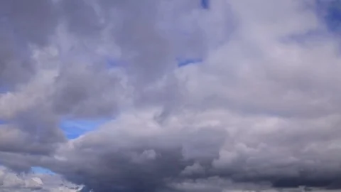 Clouds run across the blue sky timelapse Stock-Footage 74276468