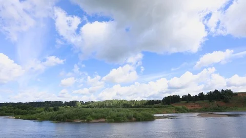 Clouds run across the blue sky. Time lapse Stock Footage 113261490