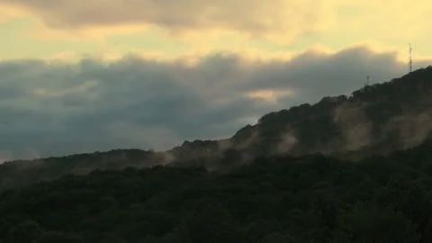 Clouds run fast in the mountains, sunset. Timelapse Stock Footage 157650127