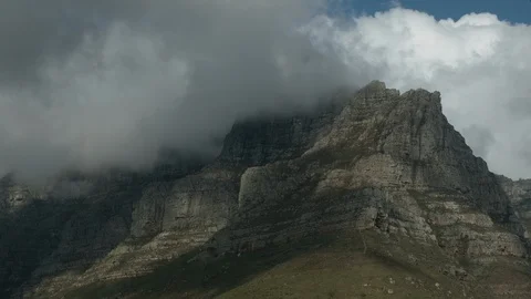 Clouds run over the Table Mountain timelapse Stock Footage 121397673