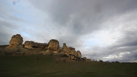 Clouds running above stone rocks Stock Footage 44909494