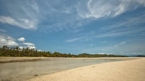 Clouds Running above a tropical beach at low tide @ Koh Phangan, Thailand Stock Footage 11120424